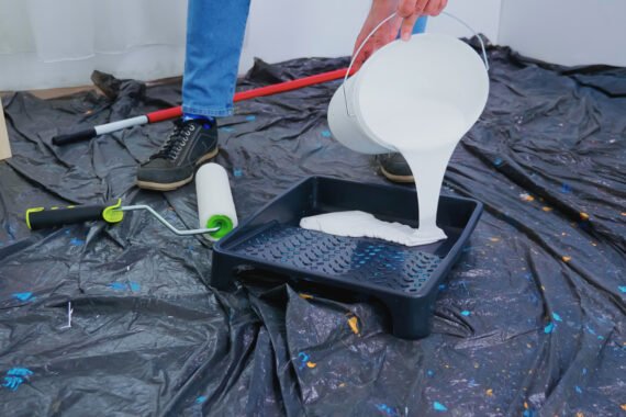 pouring white paint